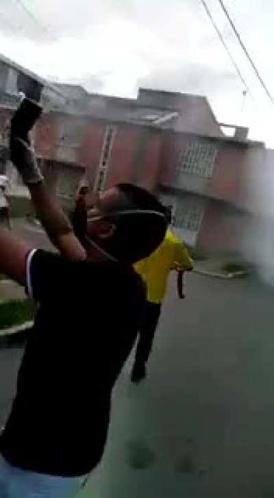 ESMAD use tear gas in a residencial area in Buga, Valle. May 5th 2021.