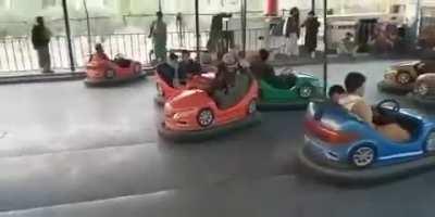 Taliban members enjoy amusement park in Kabul