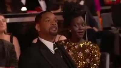 Will Smith smacking Chris Rock for joking about his wife.