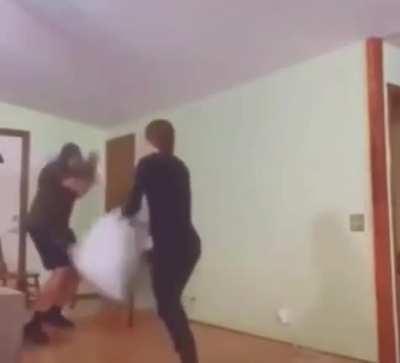Idiots fighting pillows