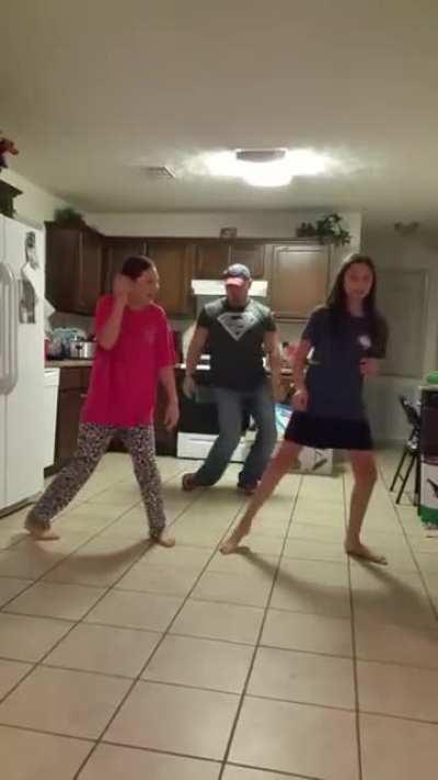 Father surprises his daughters
