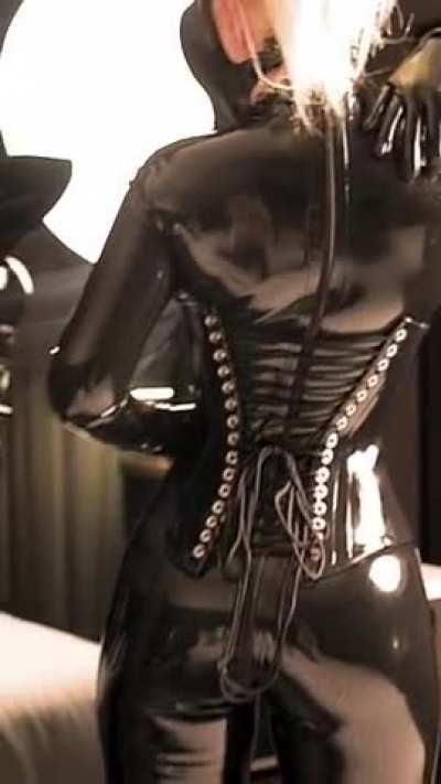 All lubed up and ultra shiny! catsuit + corset + heels + gloves + gasmask