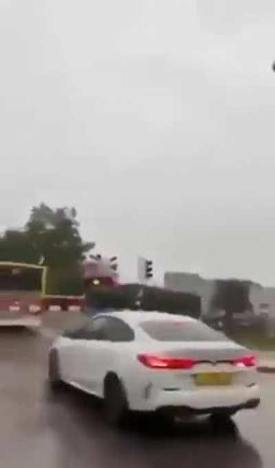 A bus gets cut in half by a train (no one injured)