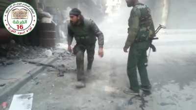 FSA fighter struggles with his DShK machine gun, switches to PKM to engage SAA positions - 4/14/2014