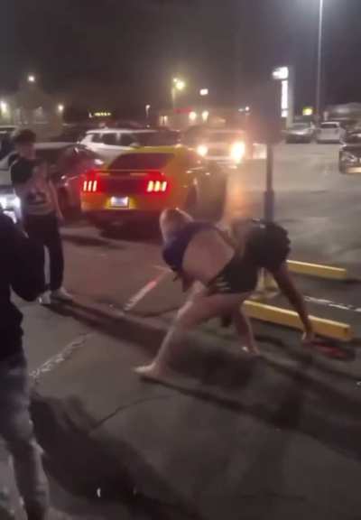Random chicks let loose in parking lot