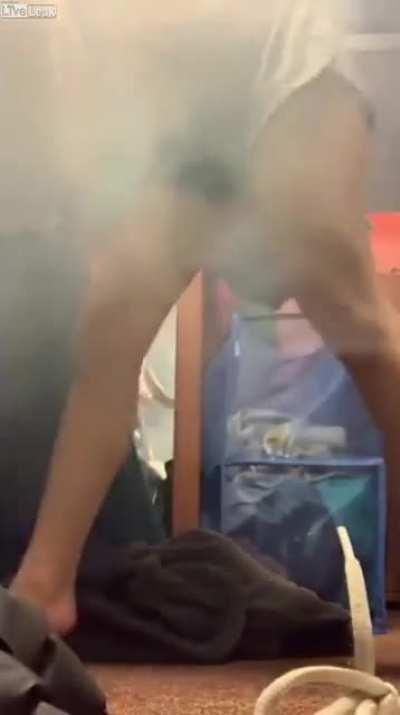 College girl lights fireworks in dorm room only to find out instantly why it's typically an outdoor activity