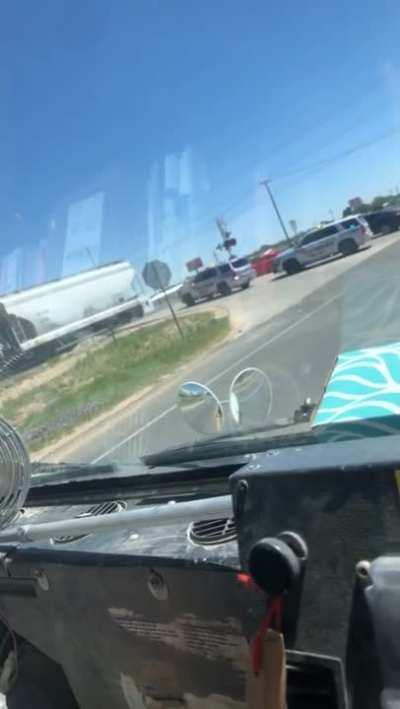 Just a normal day waiting for the train to pass so they can cross.