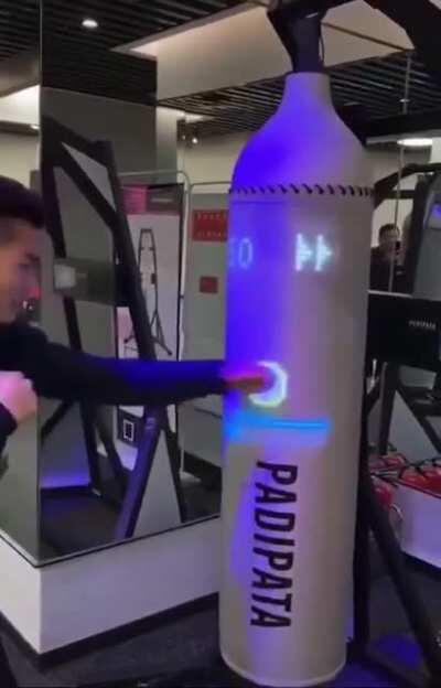 Smart punching bag with force sensors, LEDs, and games to offer you a more interactive workout. This is the Padipata Interactive Punching Bag