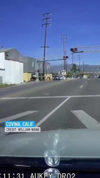 [Video] Car struck by train in Covina this morning after driving through crossing arm