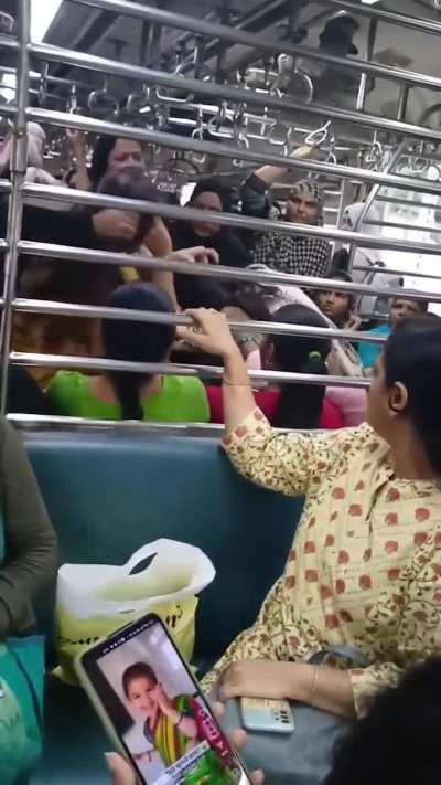 Another day, another explosive brawl unfolds in ladies compartment.