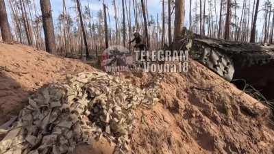 Ukrainian military manages to jump into a trench during unsuccessful demining of a TM-62, with a trap in the form of a grenade.