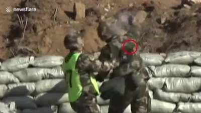 Military recruit saved after dropping live grenade at his feet