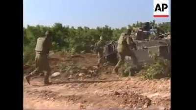 IDF Merkava struck by ATGM near Lebanon border in 2006 (corrected title)