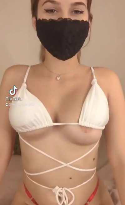 Boob falling out of bikini