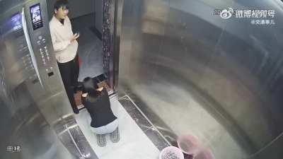 Woman in grief after losing smartphone in elevator