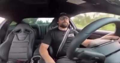 Guy drifts Mustang into a parallel park