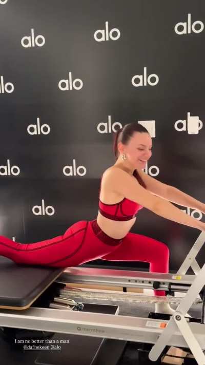 Dafne Keen working out in red