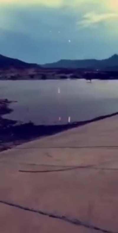 Tracer bullets bouncing off water