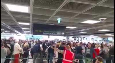 the queue to check-in at the airport today.