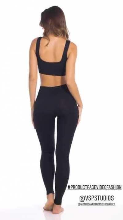 Beauty in a black, sportive, outfit