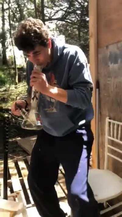 My friend try’s to be cool for the camera and ends up breaking his bong