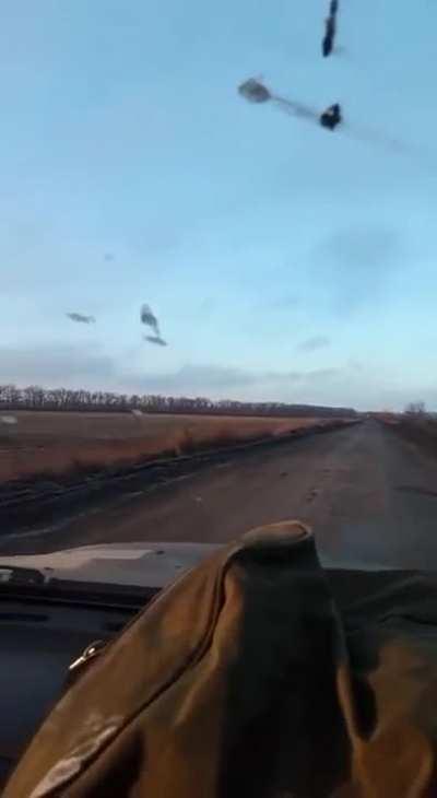Helicopter drops flares on car while passing overhead