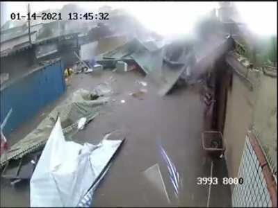 A common summer rain on a street market at São Paulo, Brazil. Jan-14-2021