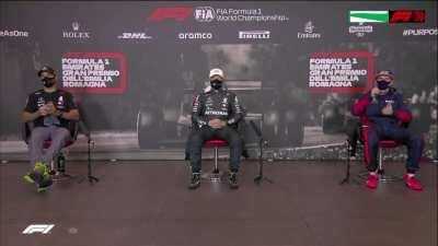 Tom Clarkson congratulating Lewis for the Pole