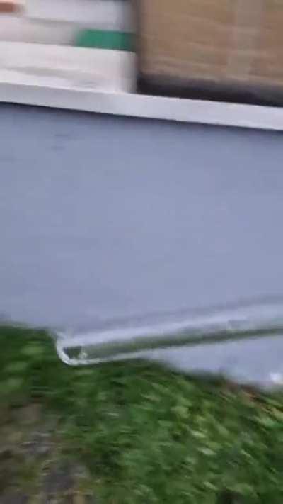 Pulling Out A Frozen Tube And Throwing It On The Road