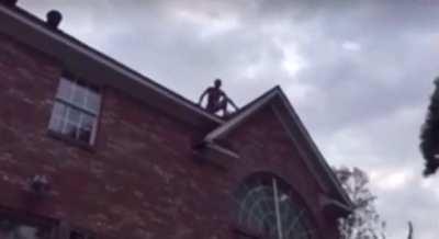 idiot jumping off a roof