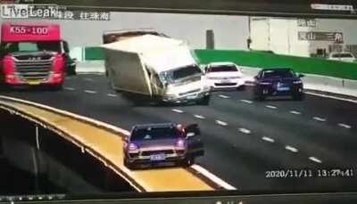 Using a tire iron for a safety triangle.