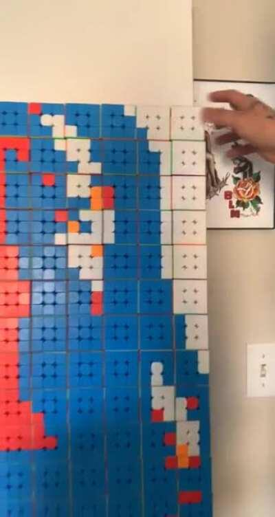 Made this mosaic of Jordan Peterson with 638 Speedcubes(Rubiks Cubes)