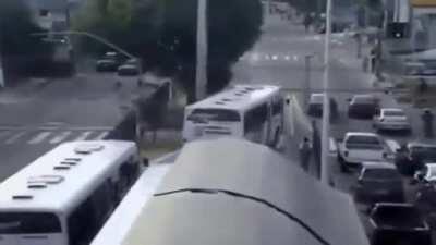 Bus driver tries to beat a train.