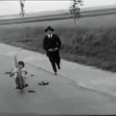 This kid in 1927 driving this motor wheel straight into Horse poop, then turning away.