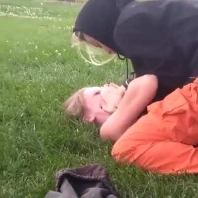 Big Sister pinned down little Sister and spit