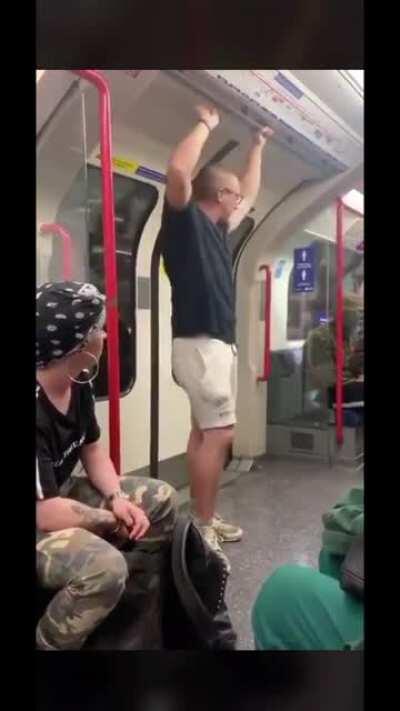 Man is being racist on the tube. Gets absolutely LAMPED