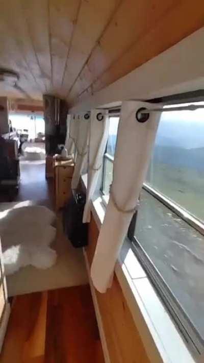 Old school bus turned into moving apartment