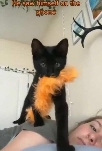 He saw himself on the phone