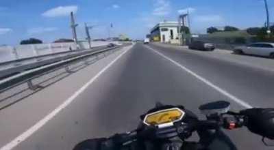 Truck collides with a biker.