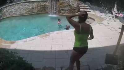 Quick mother hears her son shout that the tree is falling