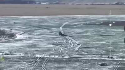 Drone footage by the Ukrainian 36th Marine Brigade in the Kursk Oblast showing a small Russian assault using armored transports, motorbikes, and quads. After getting hit with mortar and artillery fire, the Russian soldiers try to turn around, but the larg