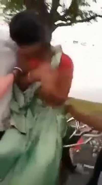 Molestation...! A group of hindutvadis found a guy and girl riding together. They stop the bike asked them if they are married, and upon finding out they are unmarried proceed to molest the girl by pinching her breast and hitting her with a stick.