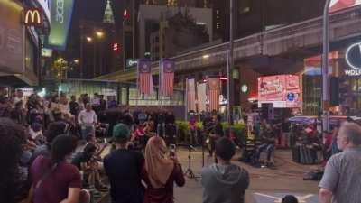 Street performance in the middle of Bukit Bintang.