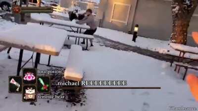 michael reeves throwing snow balls at lily meme