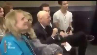 The guy in the brown suit..