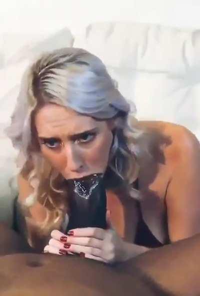 Sexy white girl sucking on a humongous black cock I’d love to see that monster destroy her holes