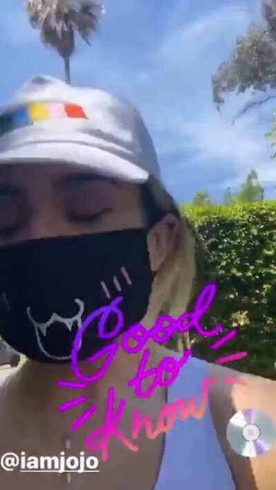 Tiny shorts and sports bra