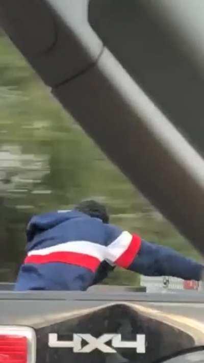 Man has balls. That's for sure. (60-70mph on main highway out of Nashville)