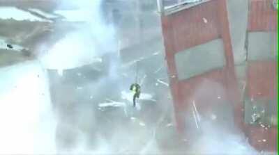 CLICK HERE TO SEEN AN IDIOT standing on top of his demolition job.