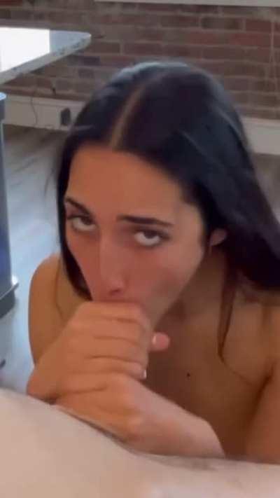 Looking at you while she sucks your cock